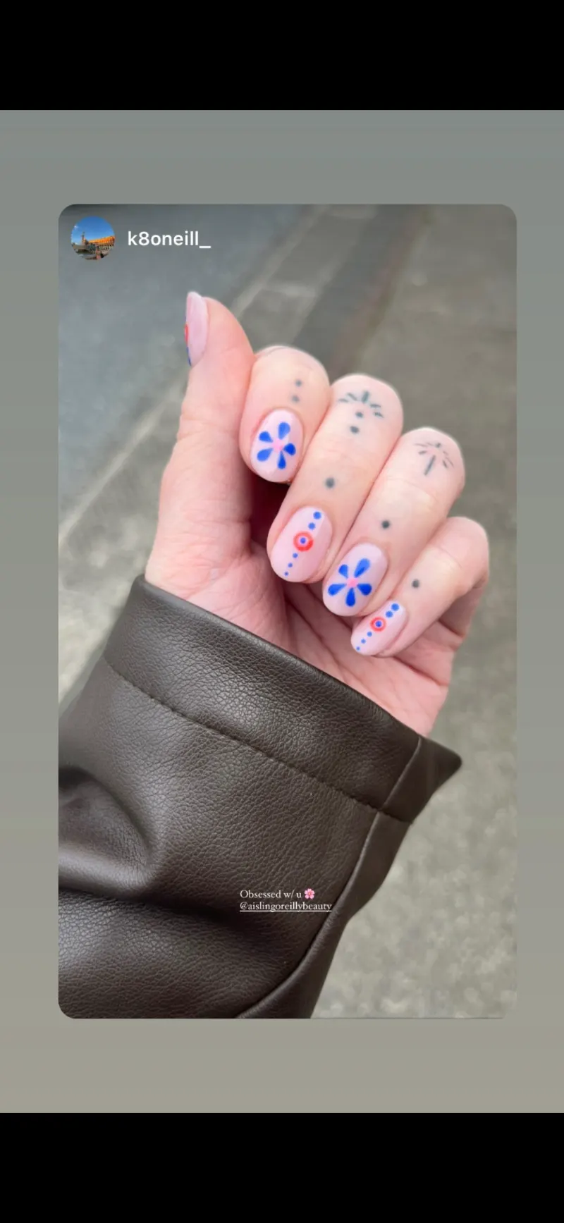 Pink nails with multicoloured designs